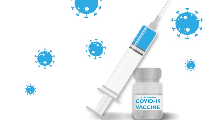 En illustration av en spruta och ett vaccin där det står corona vaccin på